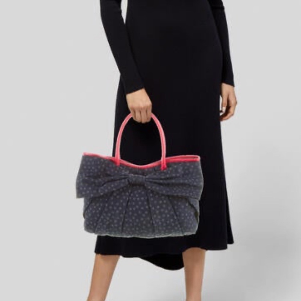 Designer Red Valentino beautiful canvas handbag.